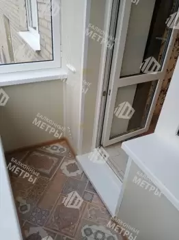 Отделка балкона под ключ с холодным остеклением и выносом остекления